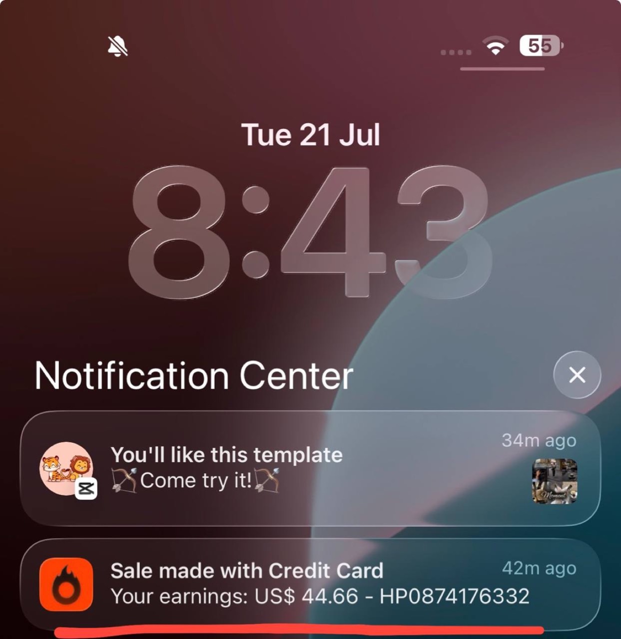 Aviso de venta de Hotmart en inglés en la pantalla de bloqueo de un iPhone